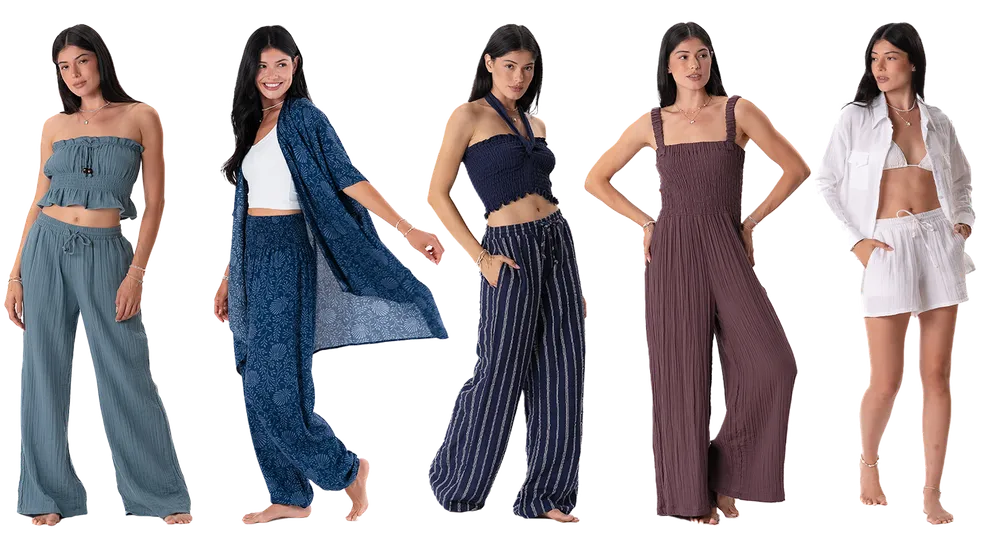 Five models in the collection: a dusty blue strapless set, a navy kimono set, striped navy pants, a plum jumpsuit, and a white shirt with shorts